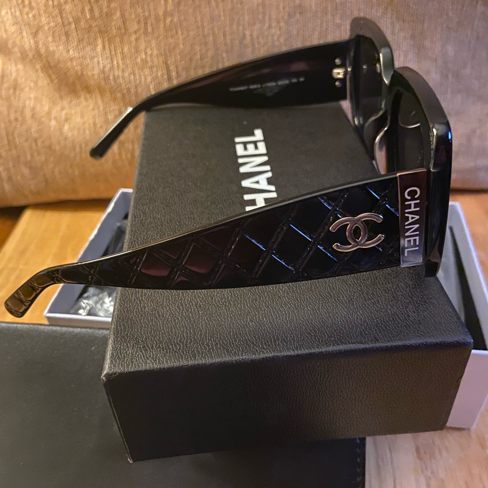 Brand new with tags in box  Chanel sunglasses with Chanel leather case.